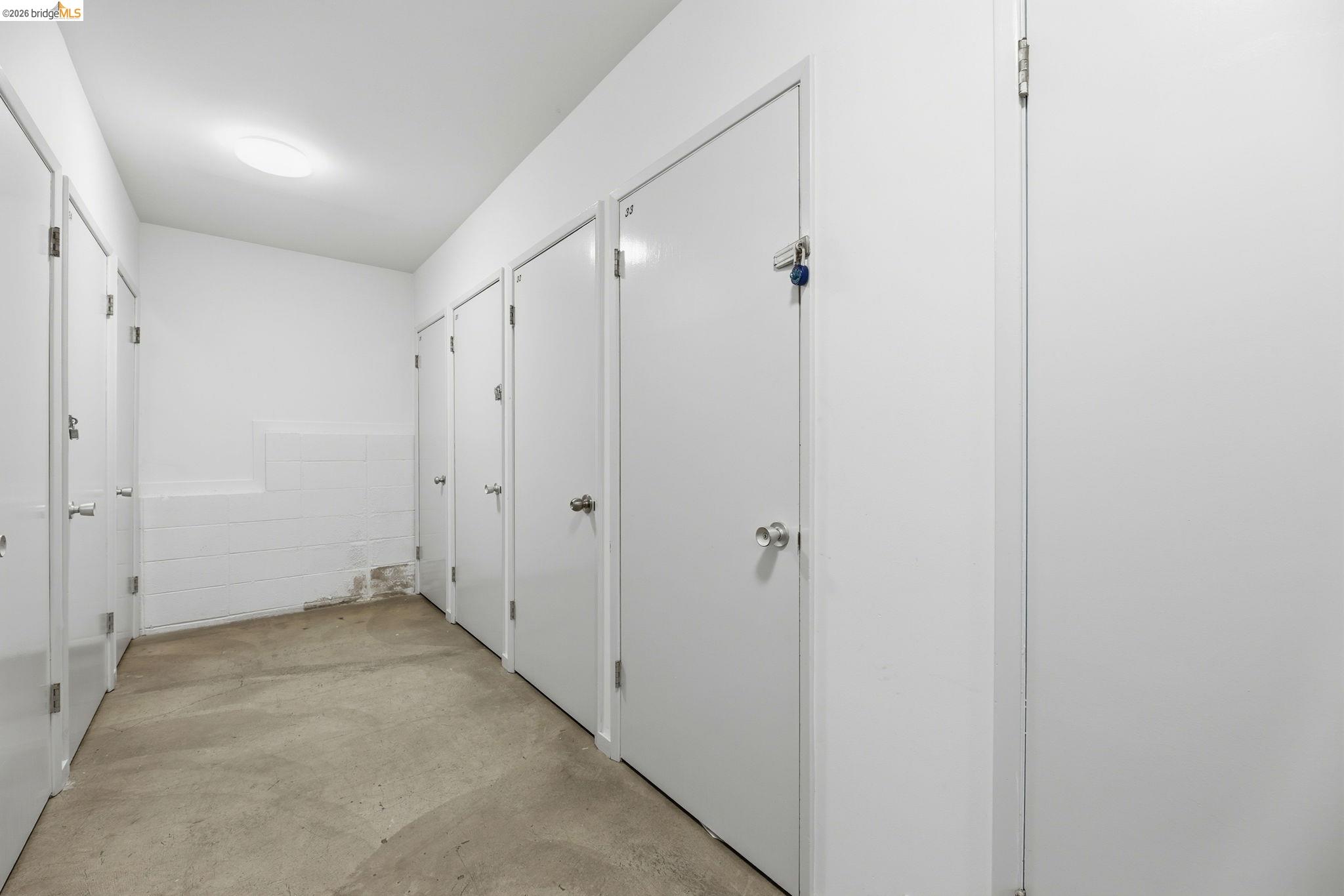 2634 Virginia Street, Unit 33 Berkeley, CA 94709 - Photo 28 of 31 Hall featuring unfinished concrete floors