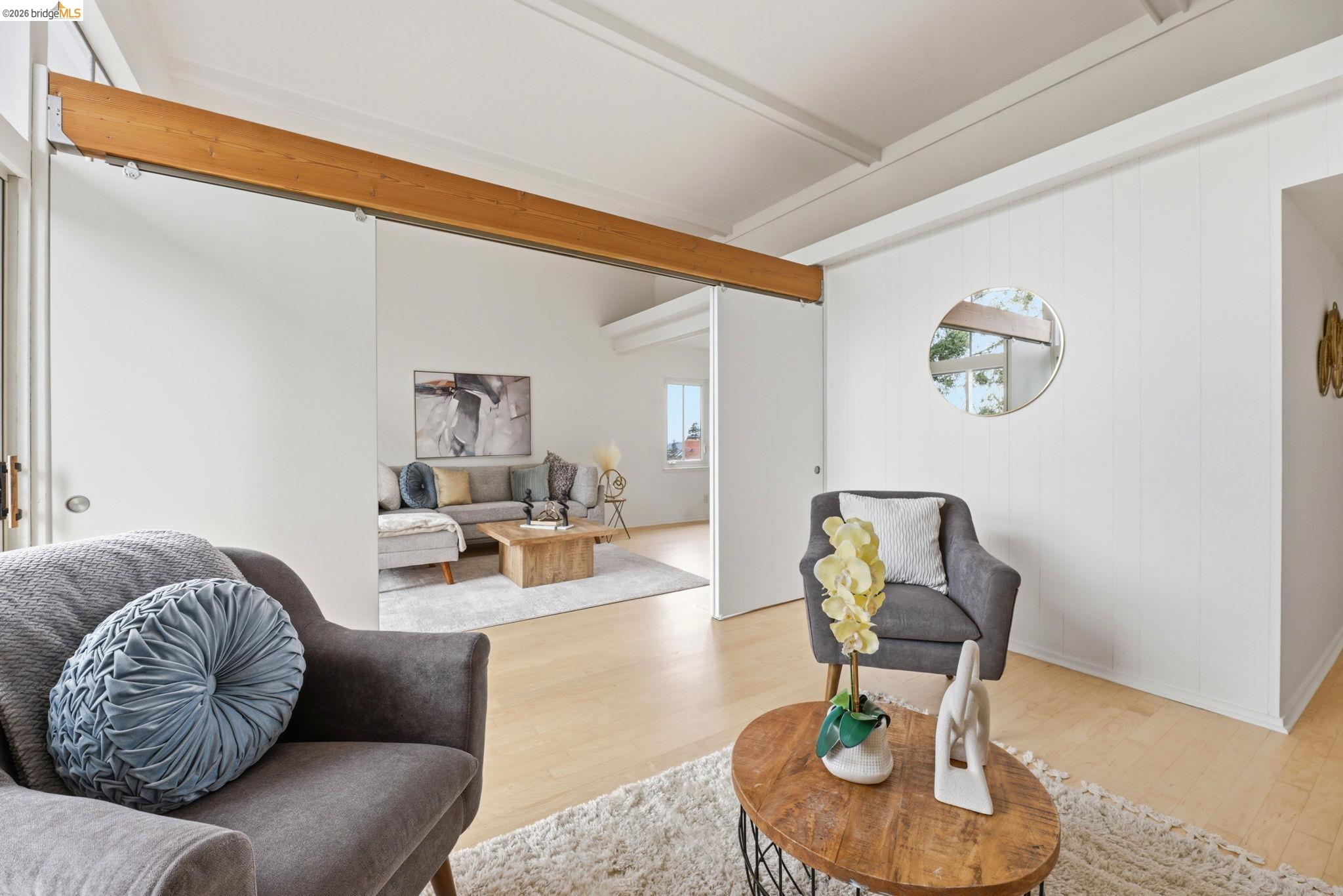 2634 Virginia Street, Unit 33 Berkeley, CA 94709 - Photo 5 of 31 a living room with furniture and wooden floor