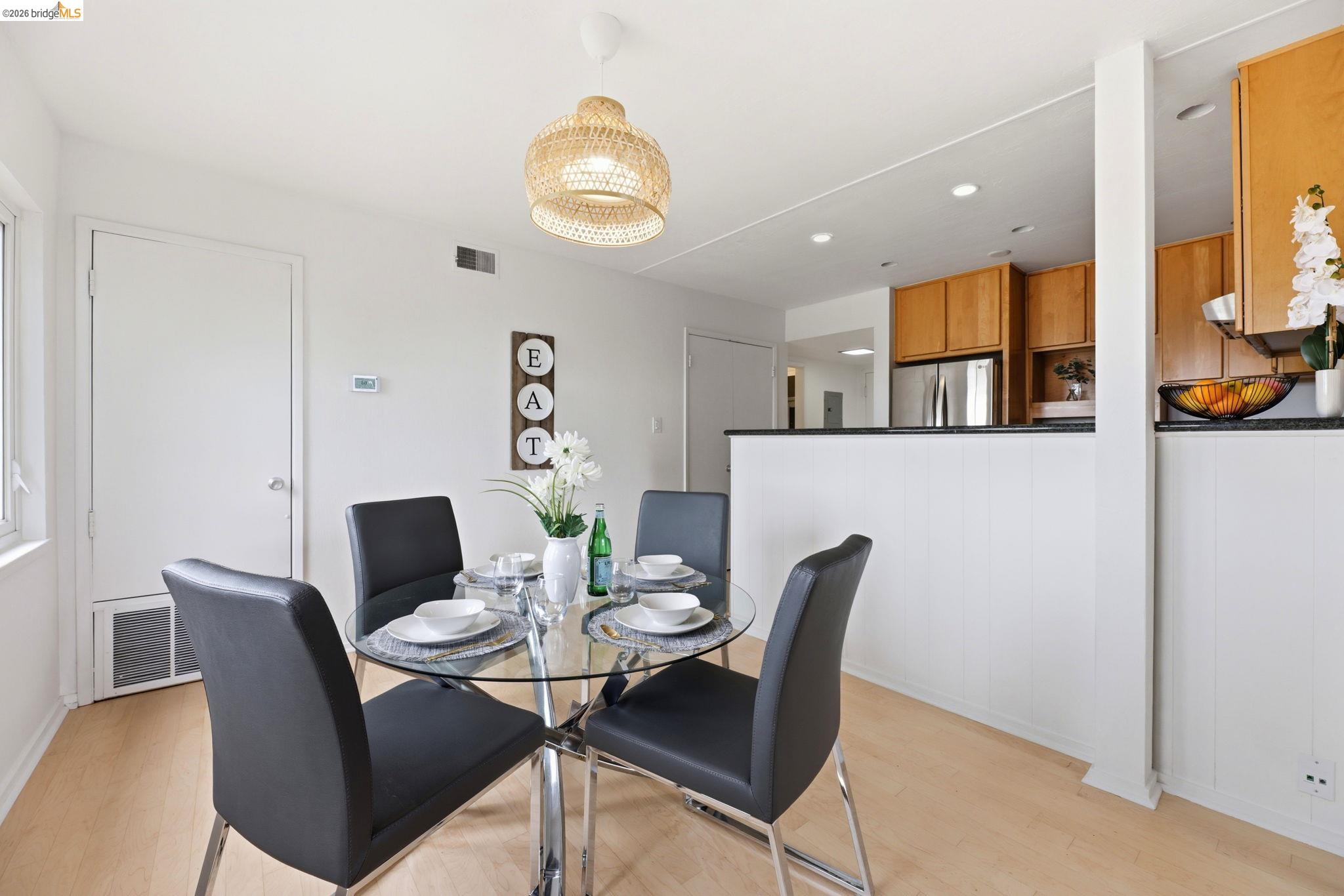 2634 Virginia Street, Unit 33 Berkeley, CA 94709 - Photo 9 of 31 a view of a dining room with furniture