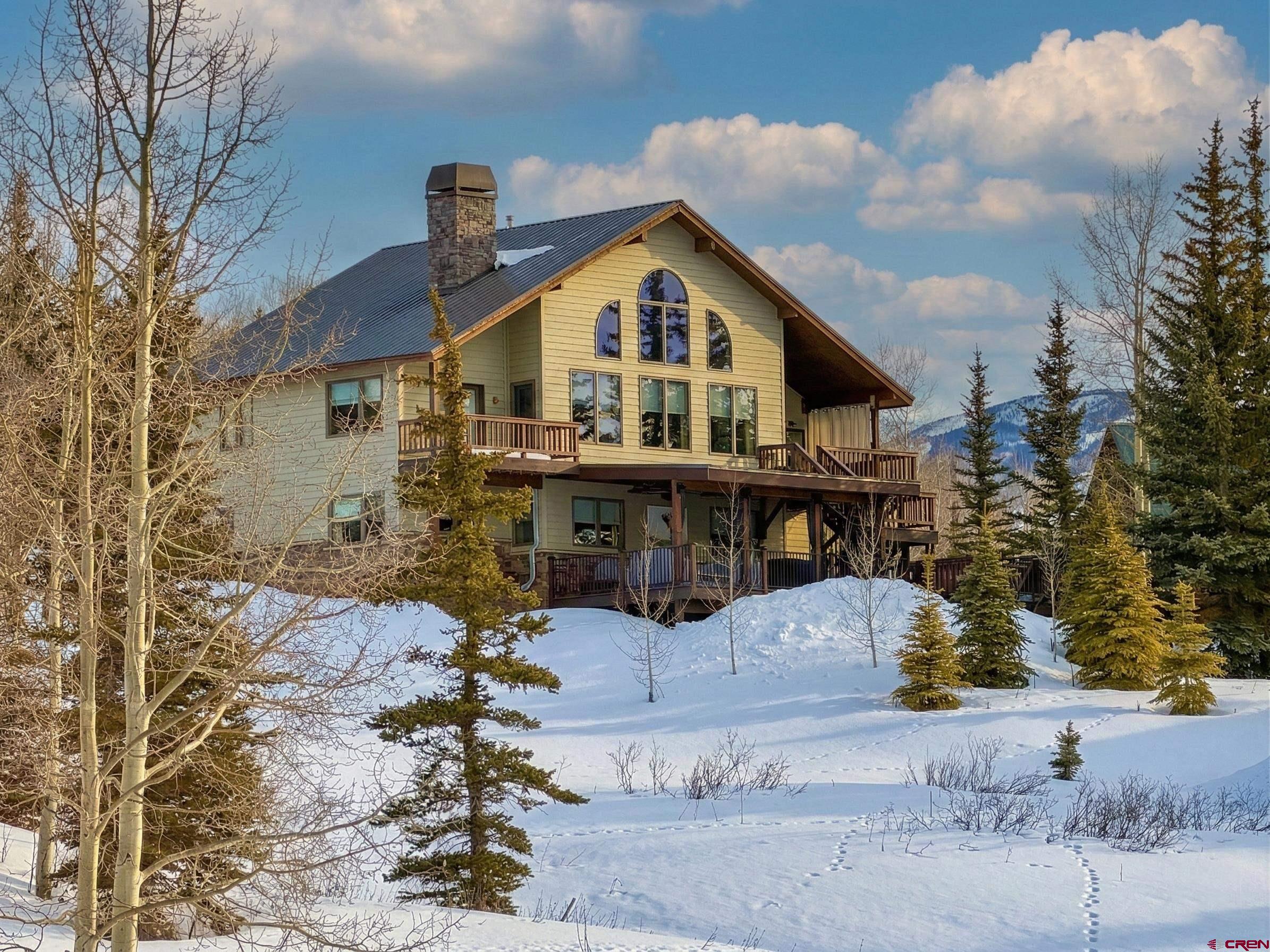 14 Ruby Drive Crested Butte, CO 81225 - Photo 2 of 44 a view of a house with a yard