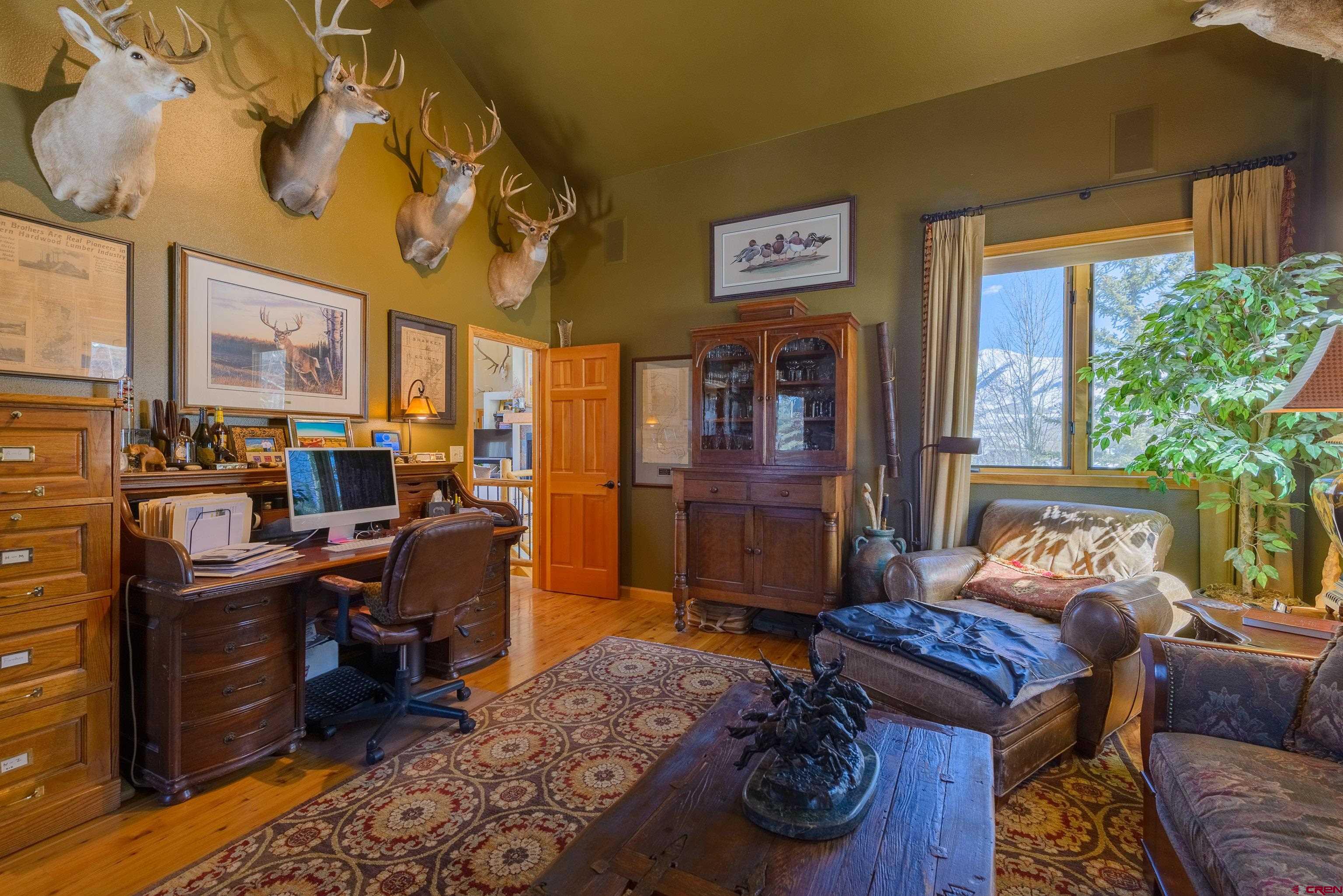 14 Ruby Drive Crested Butte, CO 81225 - Photo 24 of 44 a bedroom with furniture and a rug