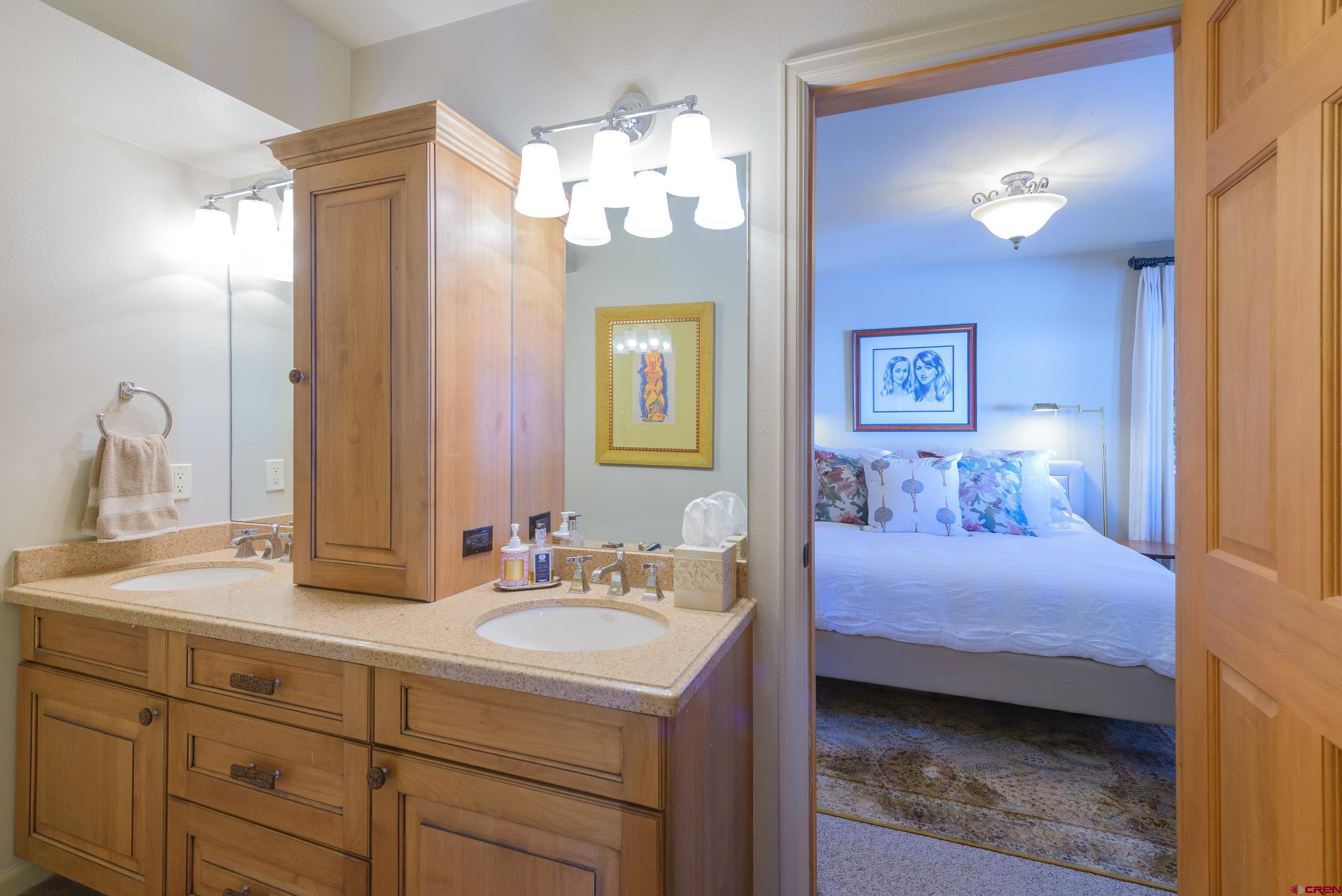 14 Ruby Drive Crested Butte, CO 81225 - Photo 34 of 44 a bathroom with a sink double vanity and a mirror