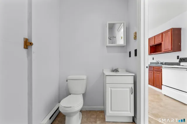 a kitchen with a stove and a sink