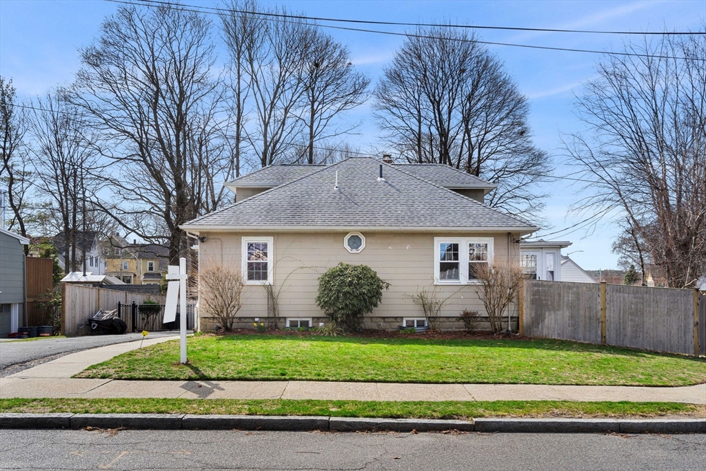 109 Linden Road Melrose, MA 02176 - Photo 13 of 15 a front view of a house with a garden