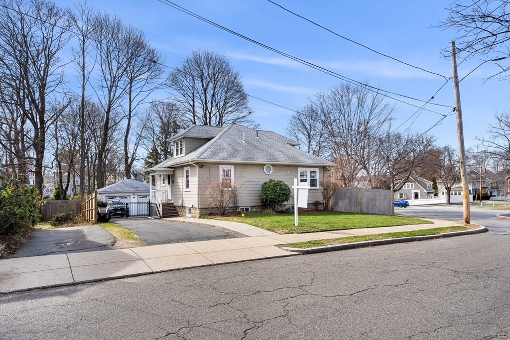 109 Linden Road Melrose, MA 02176 - Photo 2 of 15 a front view of a house with a yard