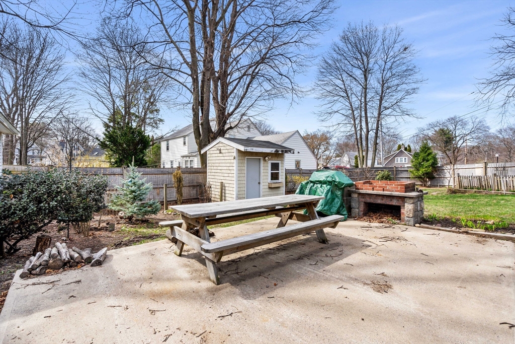109 Linden Road Melrose, MA 02176 - Photo 6 of 15 a view of a white house with a large tree and yard