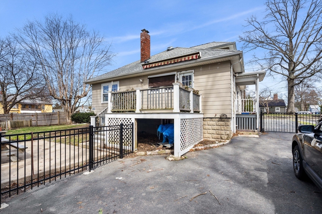 109 Linden Road Melrose, MA 02176 - Photo 10 of 15 a front view of a house with a yard and garage