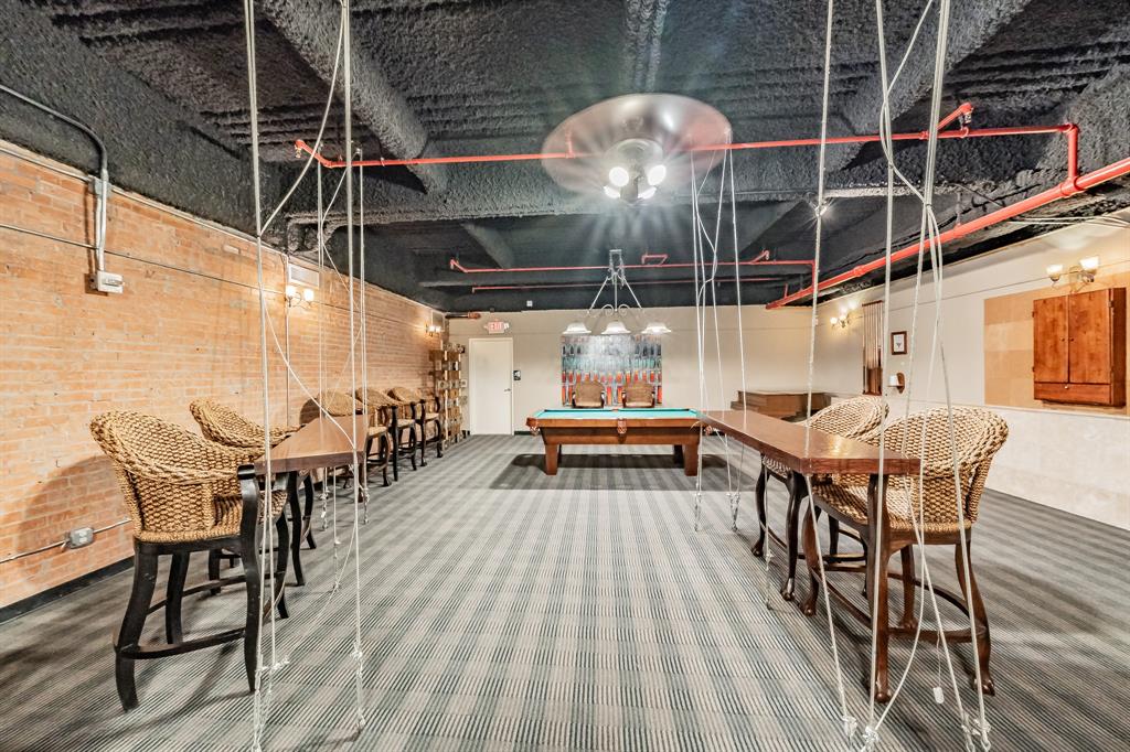 1505 Elm Street, Unit 404 Dallas, TX 75201 - Photo 29 of 40 an outdoor space with seating