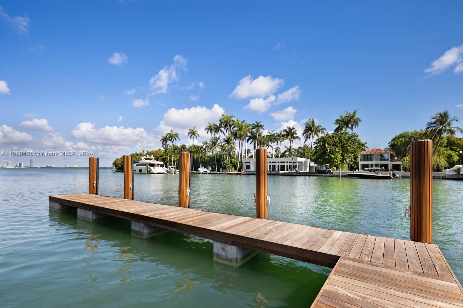 2700 Sunset Drive Miami Beach, FL 33140 - Photo 14 of 40 a view of a lake with boats and trees in the background