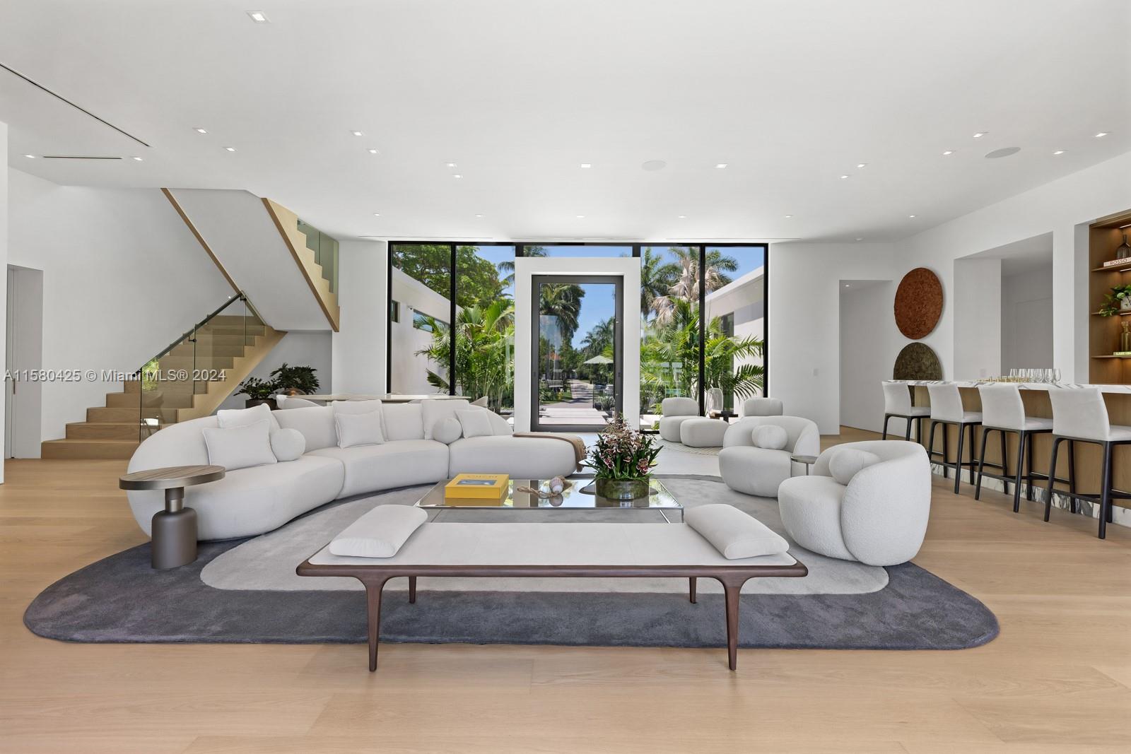 2700 Sunset Drive Miami Beach, FL 33140 - Photo 16 of 40 a living room with furniture and a large window