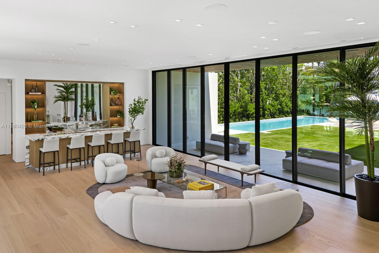 2700 Sunset Drive Miami Beach, FL 33140 - Photo 17 of 40 a living room with furniture and a large window