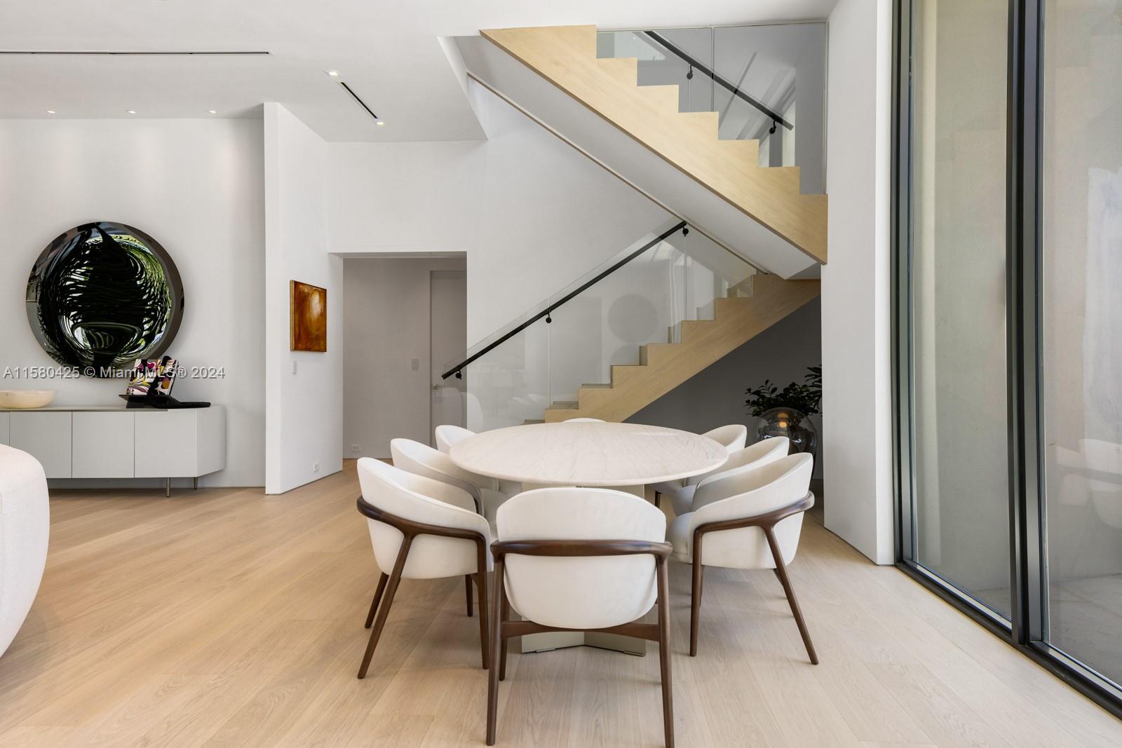 2700 Sunset Drive Miami Beach, FL 33140 - Photo 20 of 40 a view of a hallway with furniture and entryway