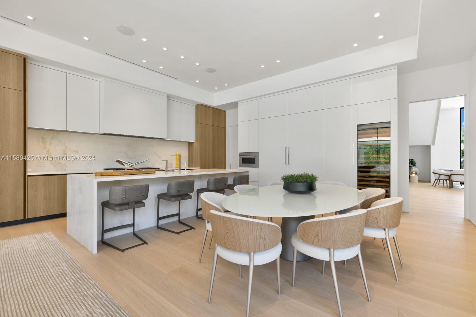 2700 Sunset Drive Miami Beach, FL 33140 - Photo 25 of 40 a view of kitchen with table and chairs