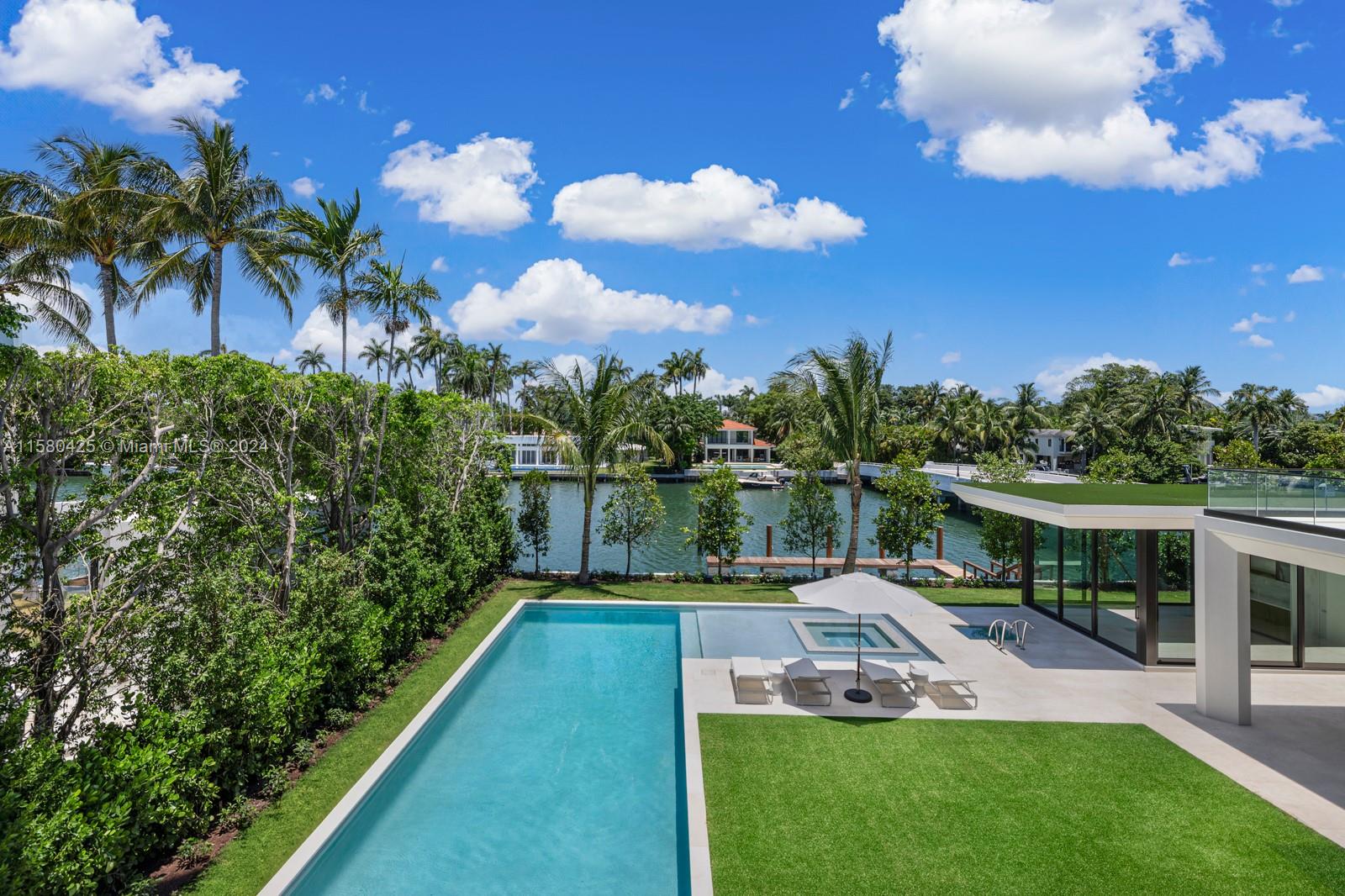 2700 Sunset Drive Miami Beach, FL 33140 - Photo 6 of 40 a view of a house with a swimming pool