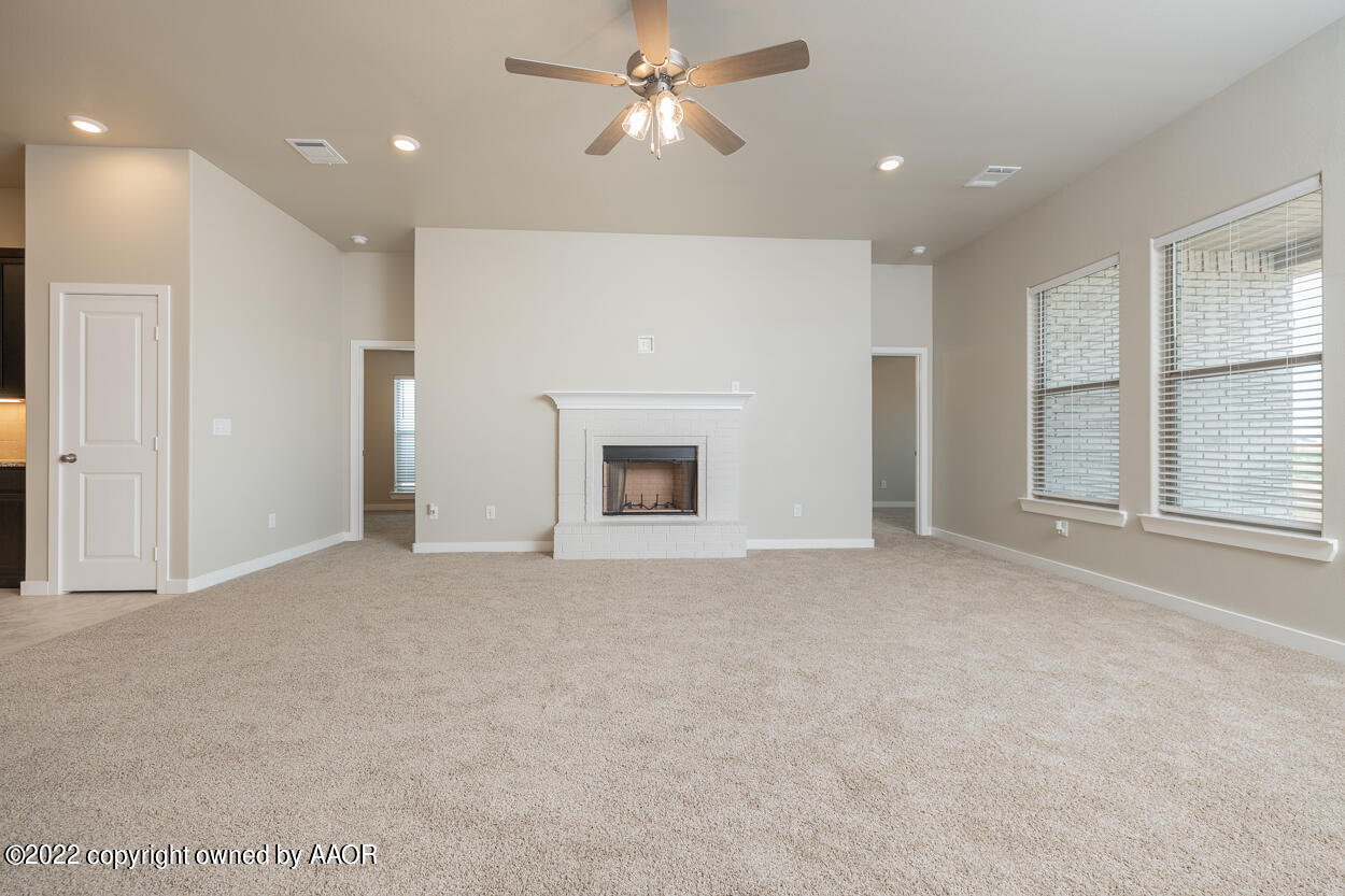 2600 Daybreak Lane Amarillo, TX 79124 - Photo 14 of 36 a view of a livingroom with a ceiling fan window and a ceiling fan