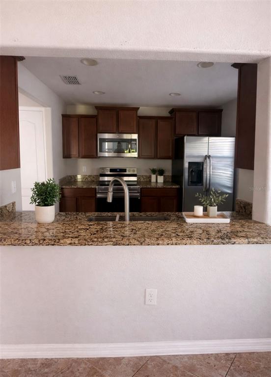 9749 Trumpet Vine Loop Trinity, FL 34655 - Photo 9 of 24