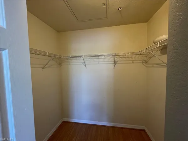 a view of a room with racks on the wall