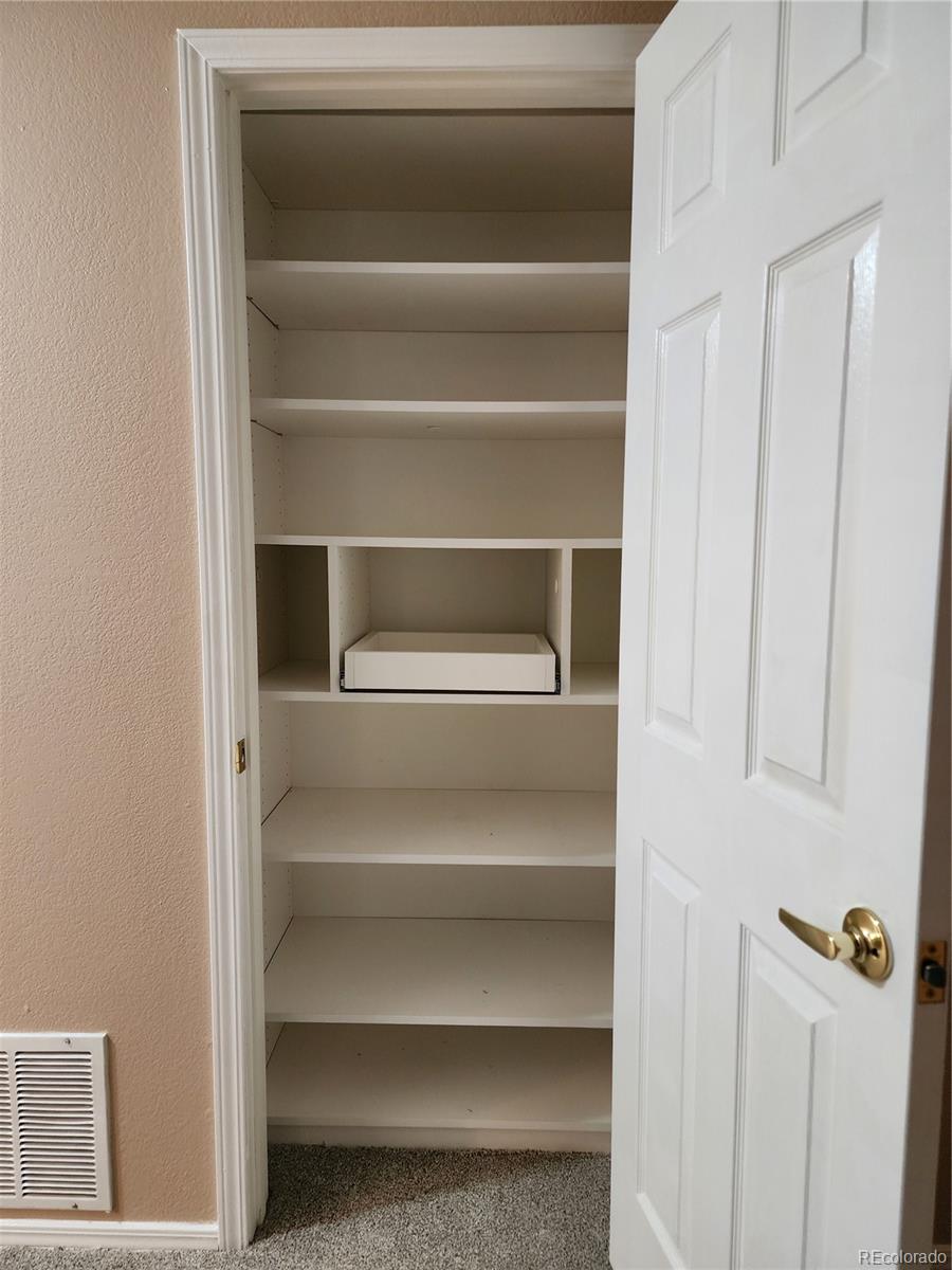 8601 East Dry Creek Road, Unit 112 Centennial, CO 80112 - Photo 11 of 19 a close view of closet