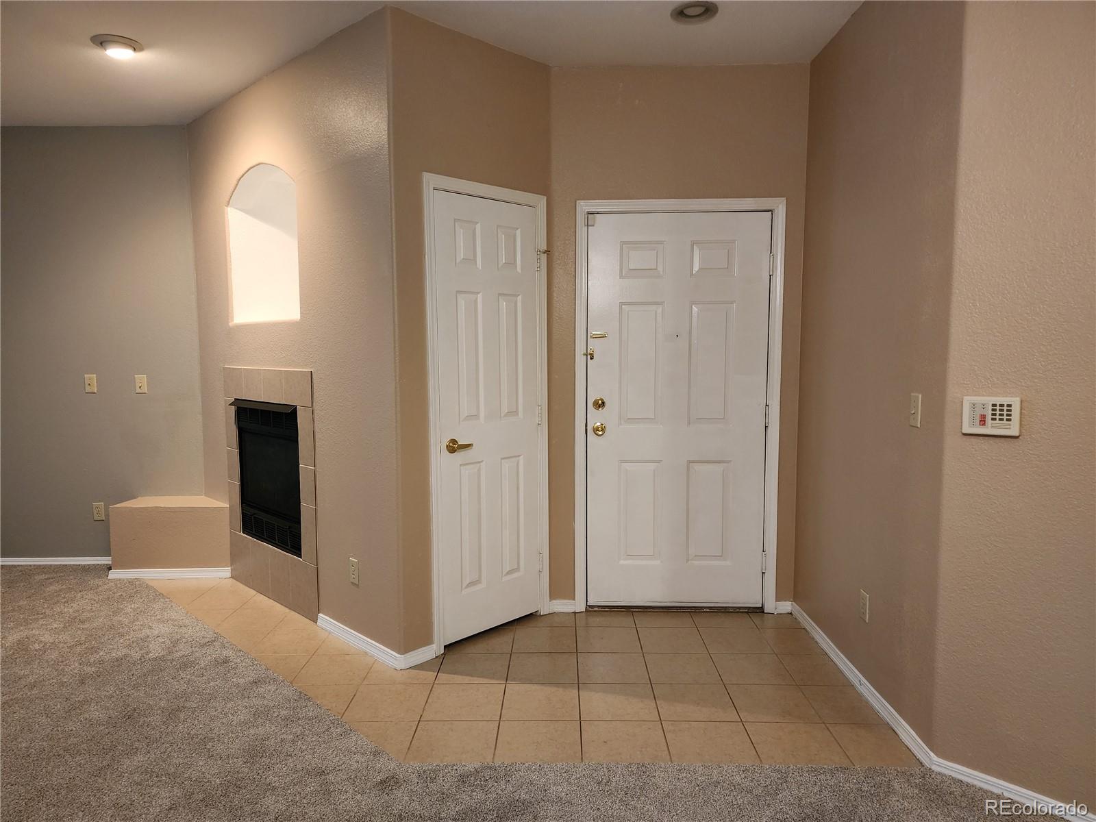8601 East Dry Creek Road, Unit 112 Centennial, CO 80112 - Photo 5 of 19 an empty room with windows and closet