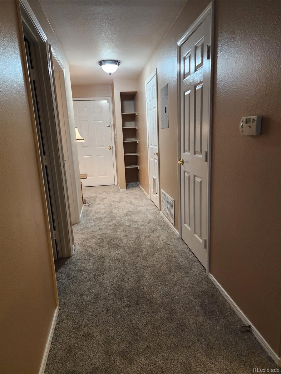 8601 East Dry Creek Road, Unit 112 Centennial, CO 80112 - Photo 10 of 19 en view interior of the house