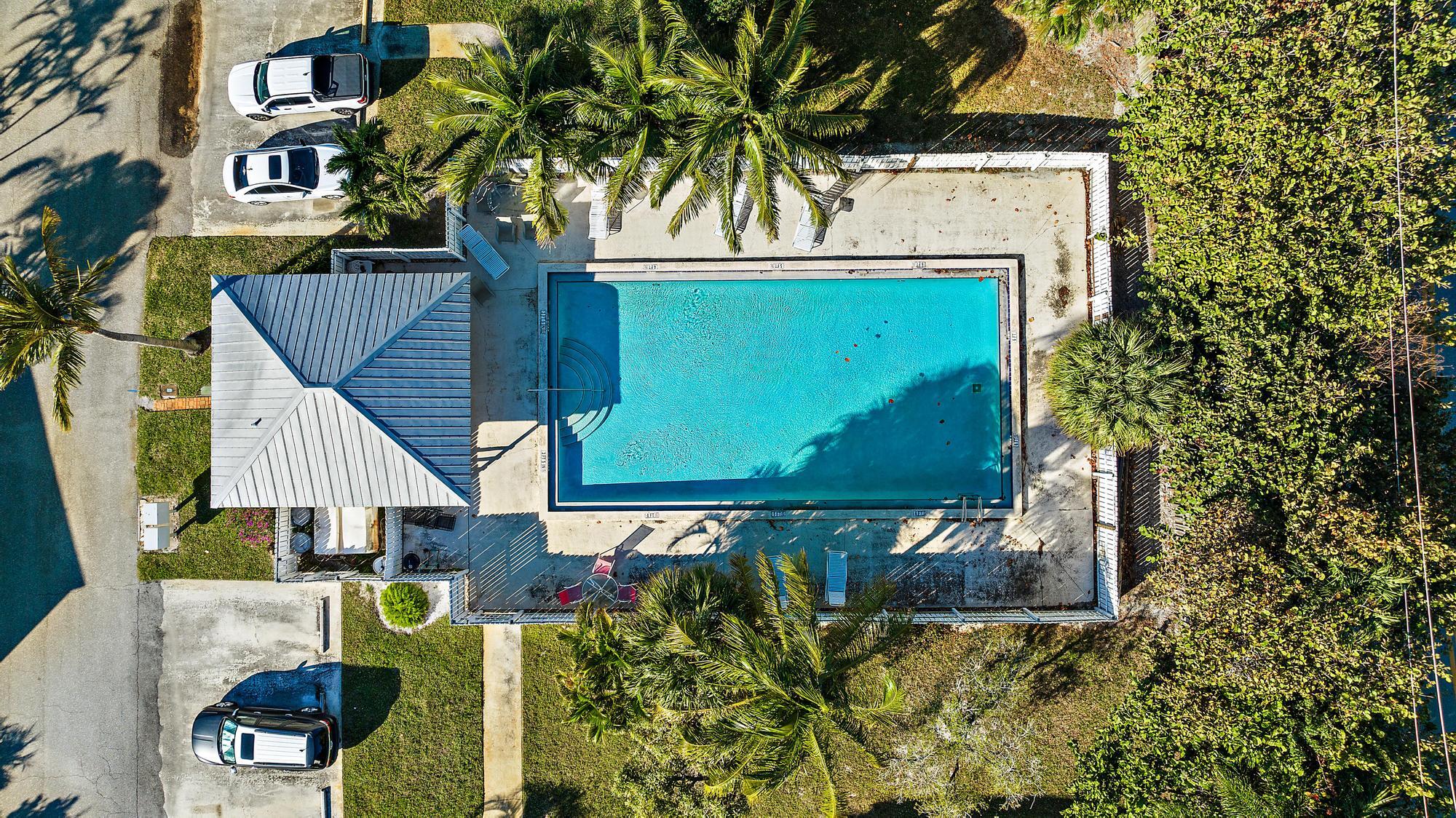 141 East Riverside Drive, Unit 11B Jupiter, FL 33469 - Photo 23 of 29 Clubhouse Pool
