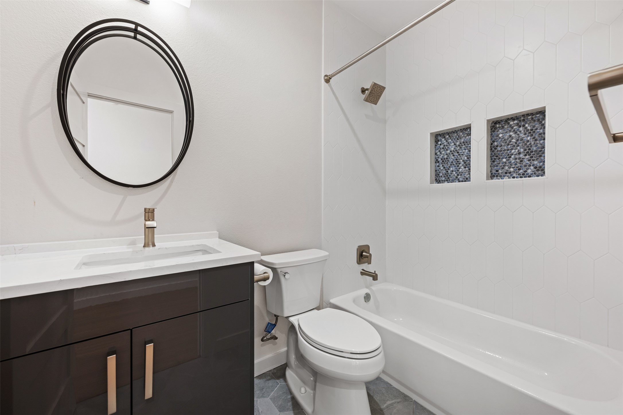 3010 Webberville Road, Unit 1 Austin, TX 78702 - Photo 1 of 38 a bathroom with a sink a toilet and a mirror