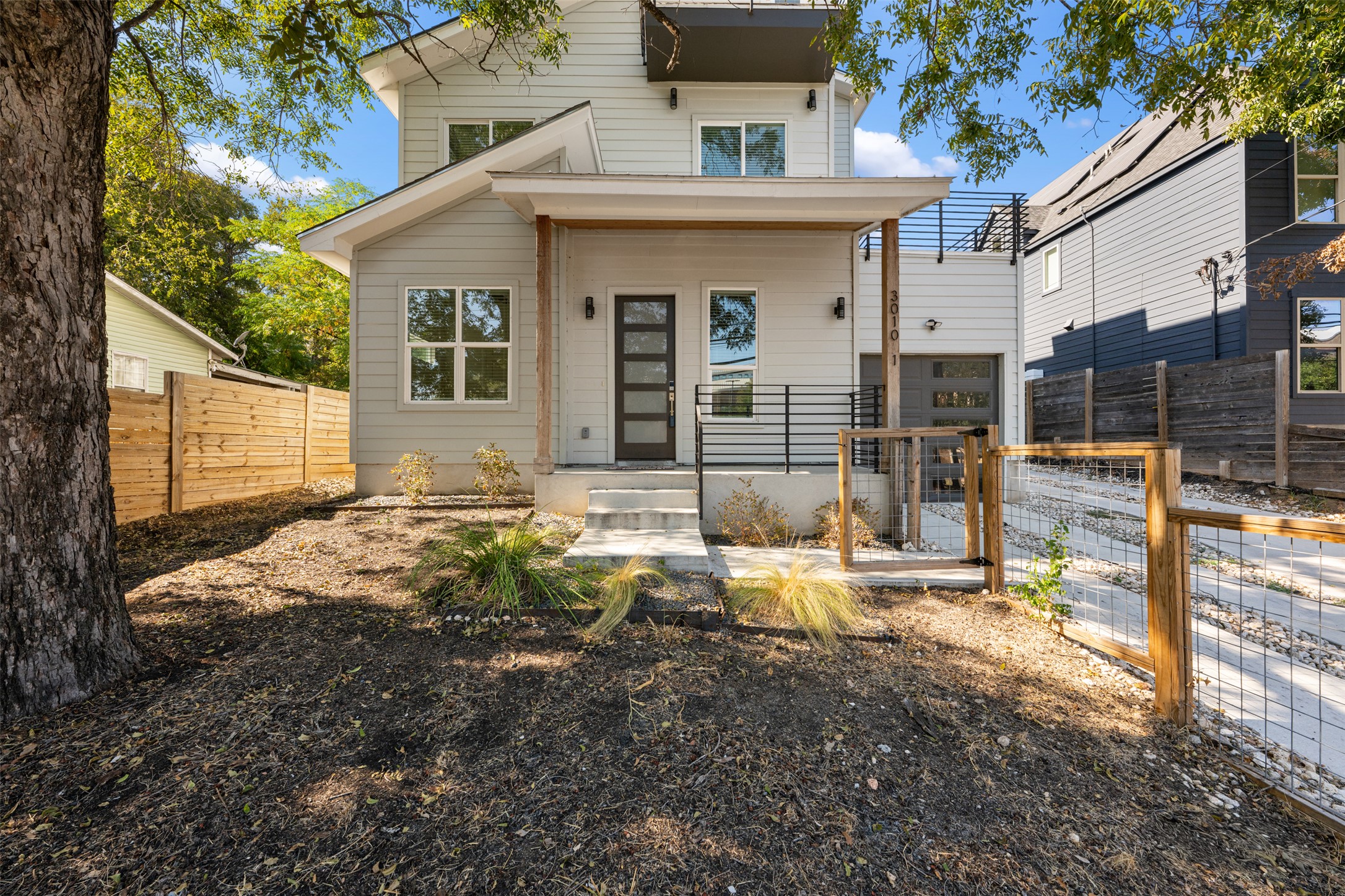 3010 Webberville Road, Unit 1 Austin, TX 78702 - Photo 12 of 38 a view of a house with backyard and sitting area