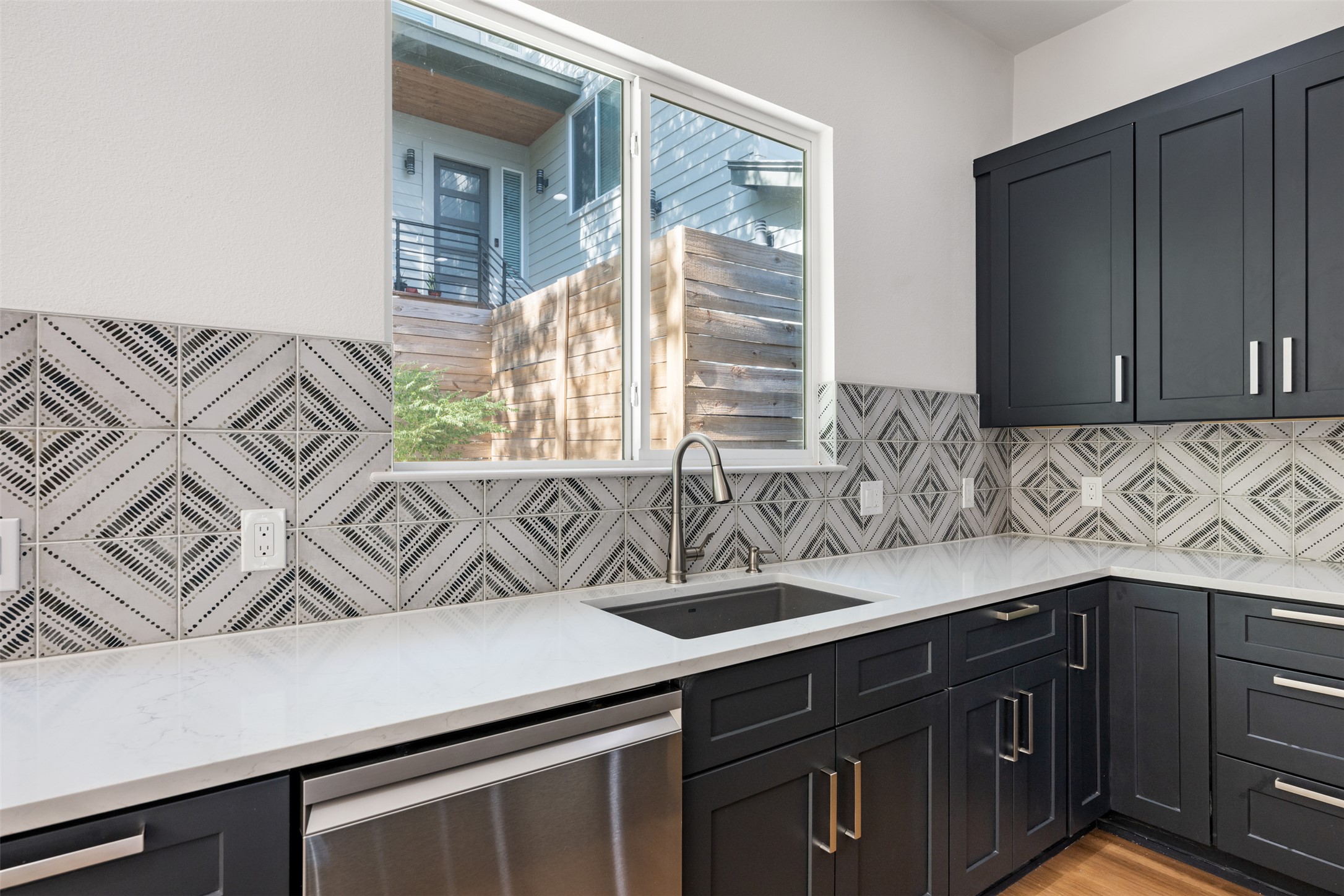 3010 Webberville Road, Unit 1 Austin, TX 78702 - Photo 22 of 38 a kitchen with a sink and a window
