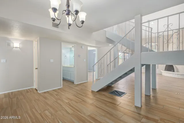 a view of an entryway with wooden floor