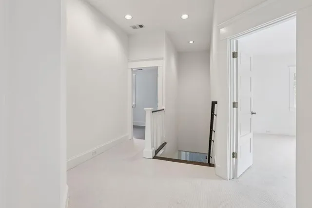 a view of a hallway with closet