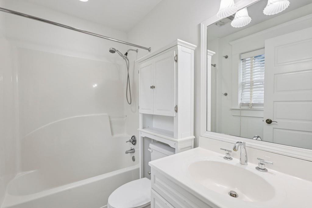 36 South Prado Northeast Atlanta, GA 30309 - Photo 25 of 31 a bathroom with a sink toilet and shower