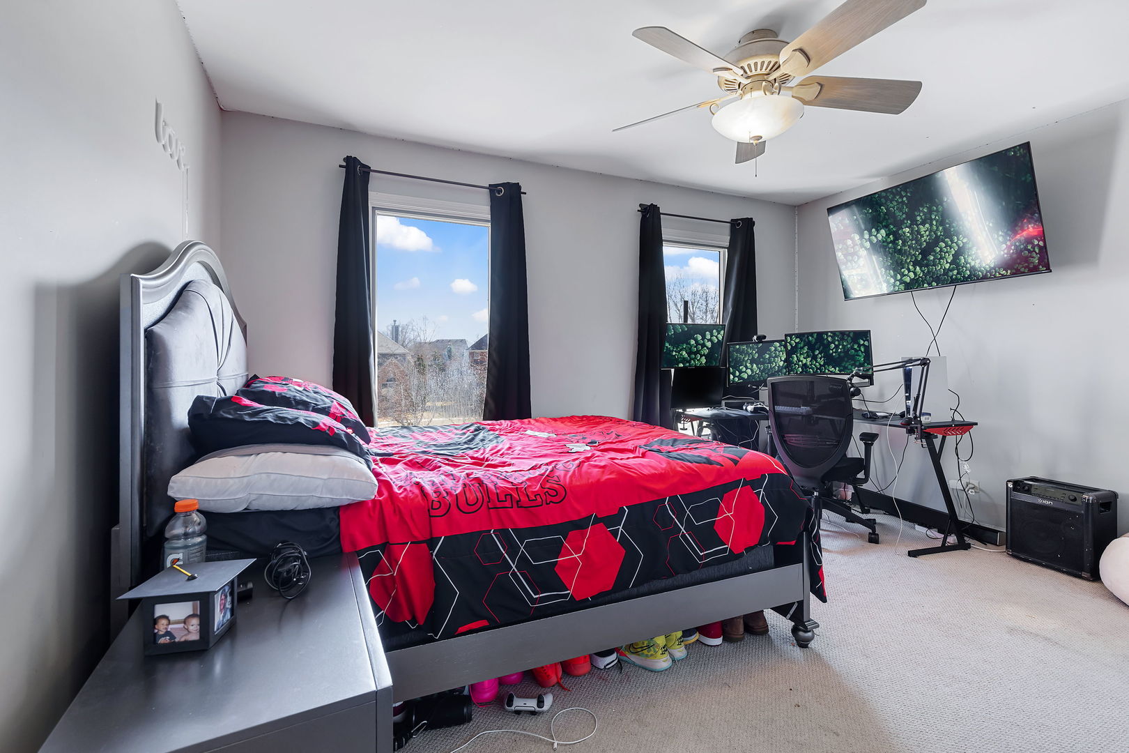 Undisclosed Address Aurora, IL 60502 - Photo 14 of 18 a bedroom with a bed gym equipment and a window