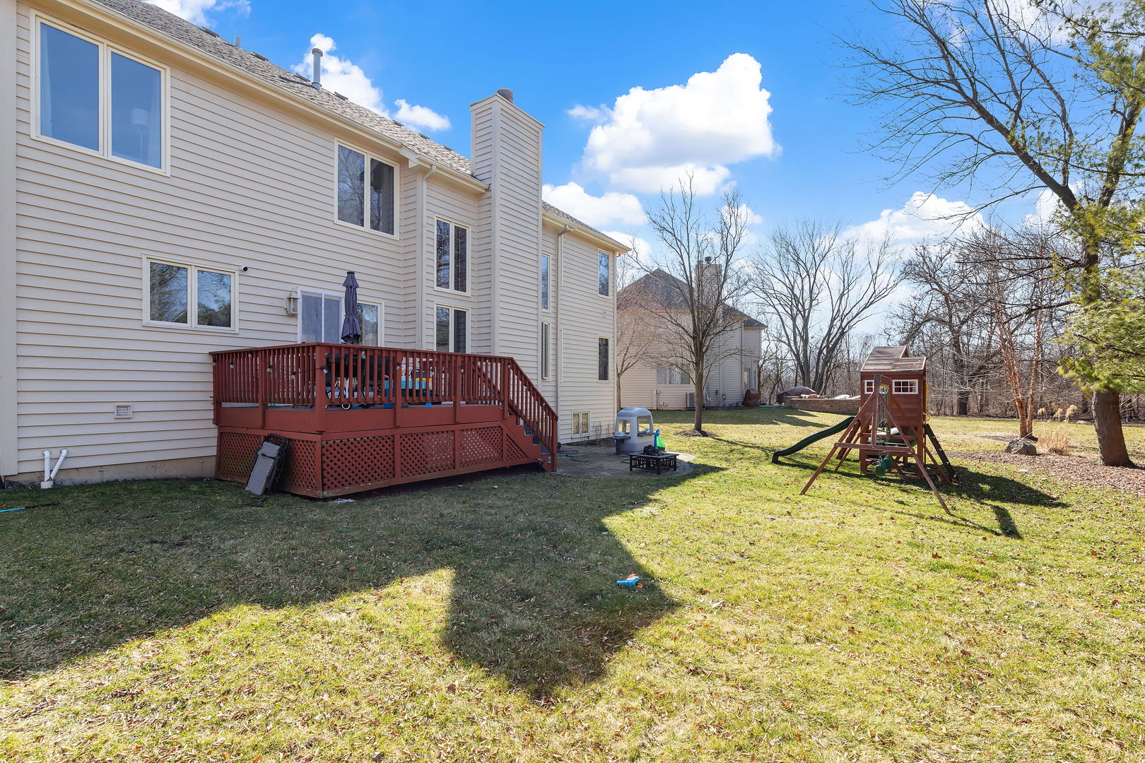 Undisclosed Address Aurora, IL 60502 - Photo 17 of 18 a view of a backyard with swimming pool