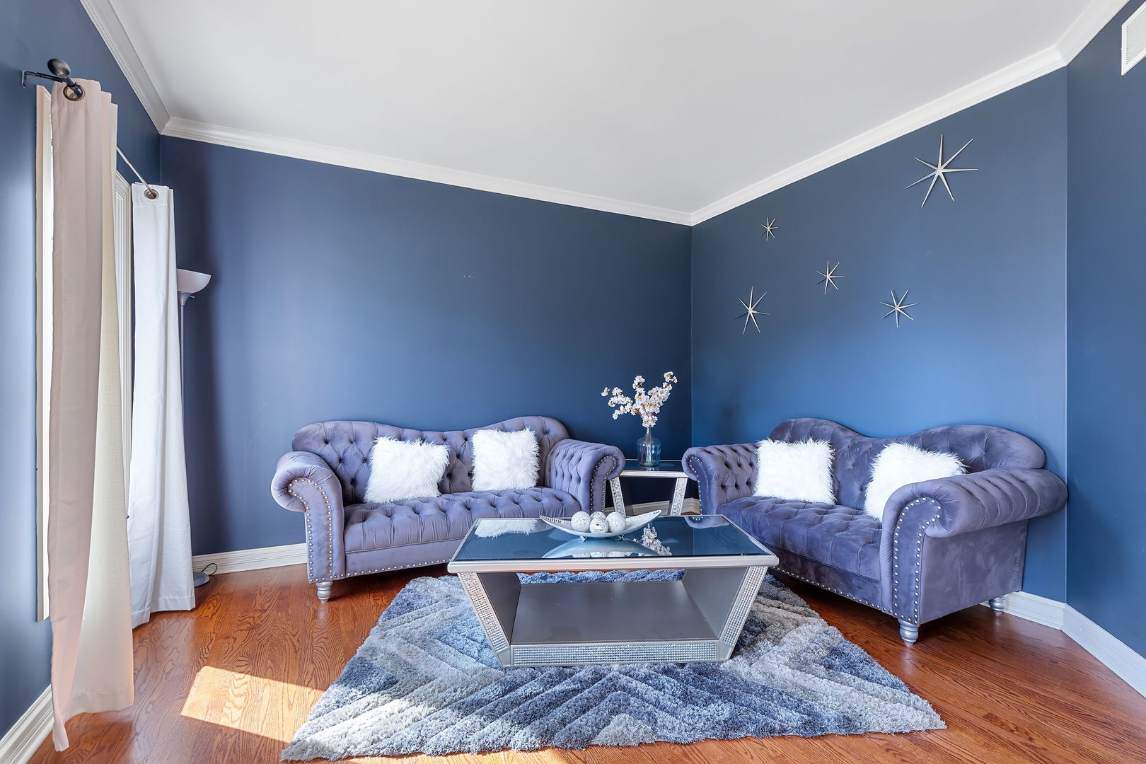 Undisclosed Address Aurora, IL 60502 - Photo 2 of 18 a living room with furniture and wooden floor