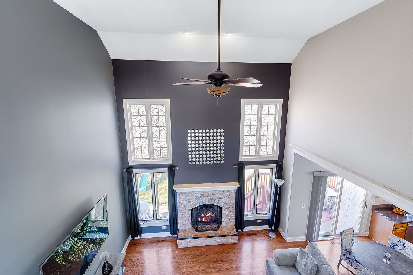 Undisclosed Address Aurora, IL 60502 - Photo 5 of 18 a view of an livingroom with furniture fire place and an entryway