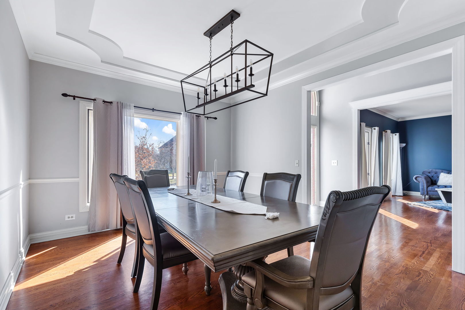 Undisclosed Address Aurora, IL 60502 - Photo 6 of 18 a view of a dining room with furniture window and wooden floor
