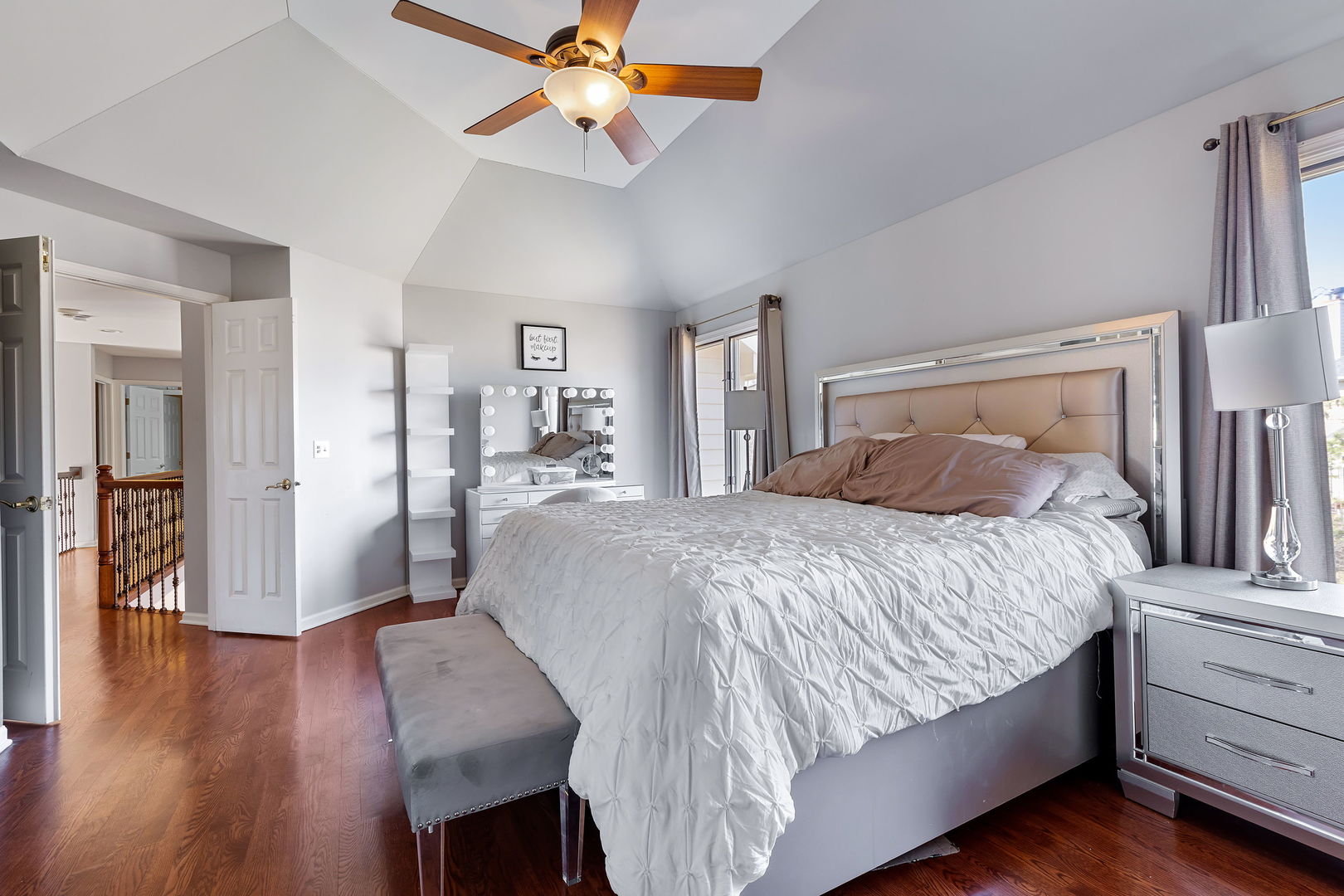 Undisclosed Address Aurora, IL 60502 - Photo 10 of 18 a bedroom with a bed and a chandelier