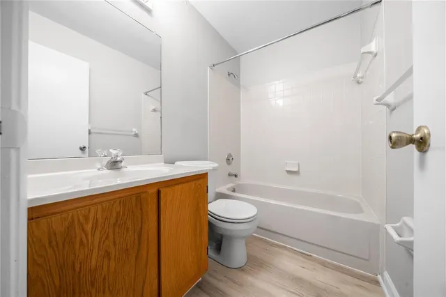 a bathroom with a sink a toilet and a bathtub