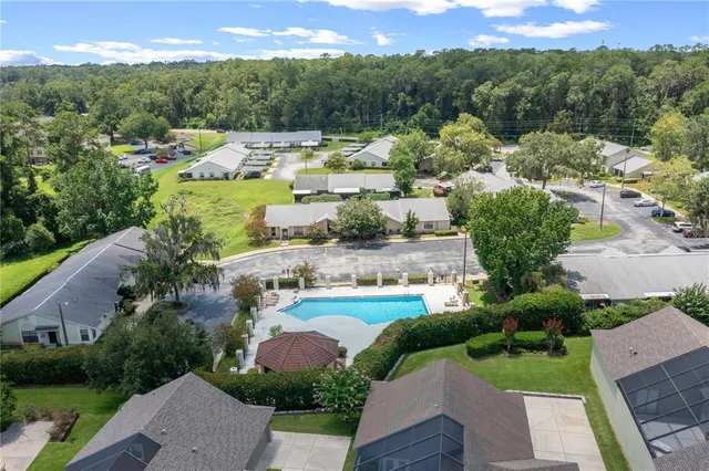 an aerial view of a house with a garden