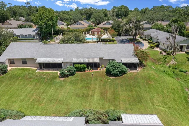an aerial view of a house with a garden