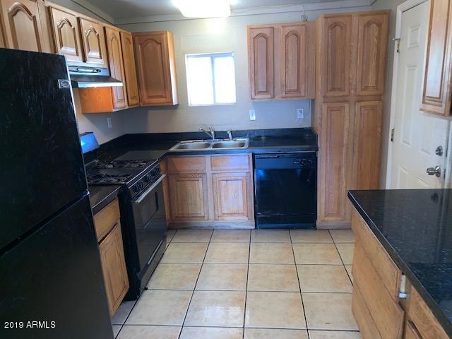 1722 West Chipman Road Phoenix, AZ 85041 - Photo 3 of 9 IMG_0641