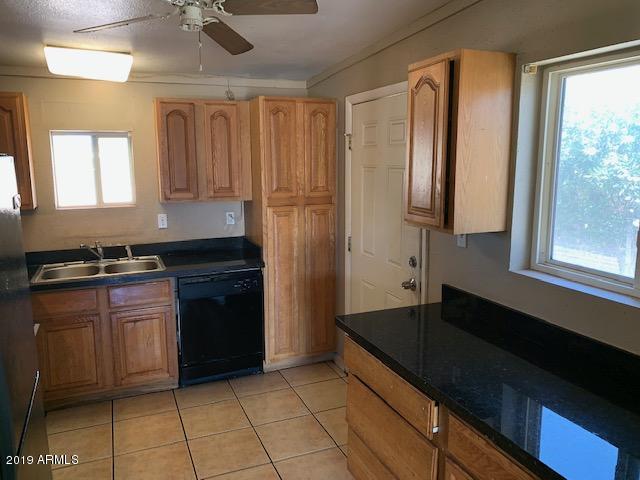 1722 West Chipman Road Phoenix, AZ 85041 - Photo 4 of 9 IMG_0643