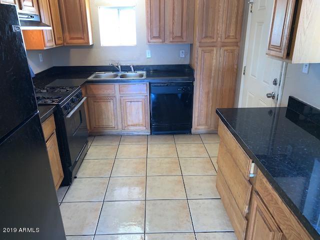 1722 West Chipman Road Phoenix, AZ 85041 - Photo 5 of 9 IMG_0644