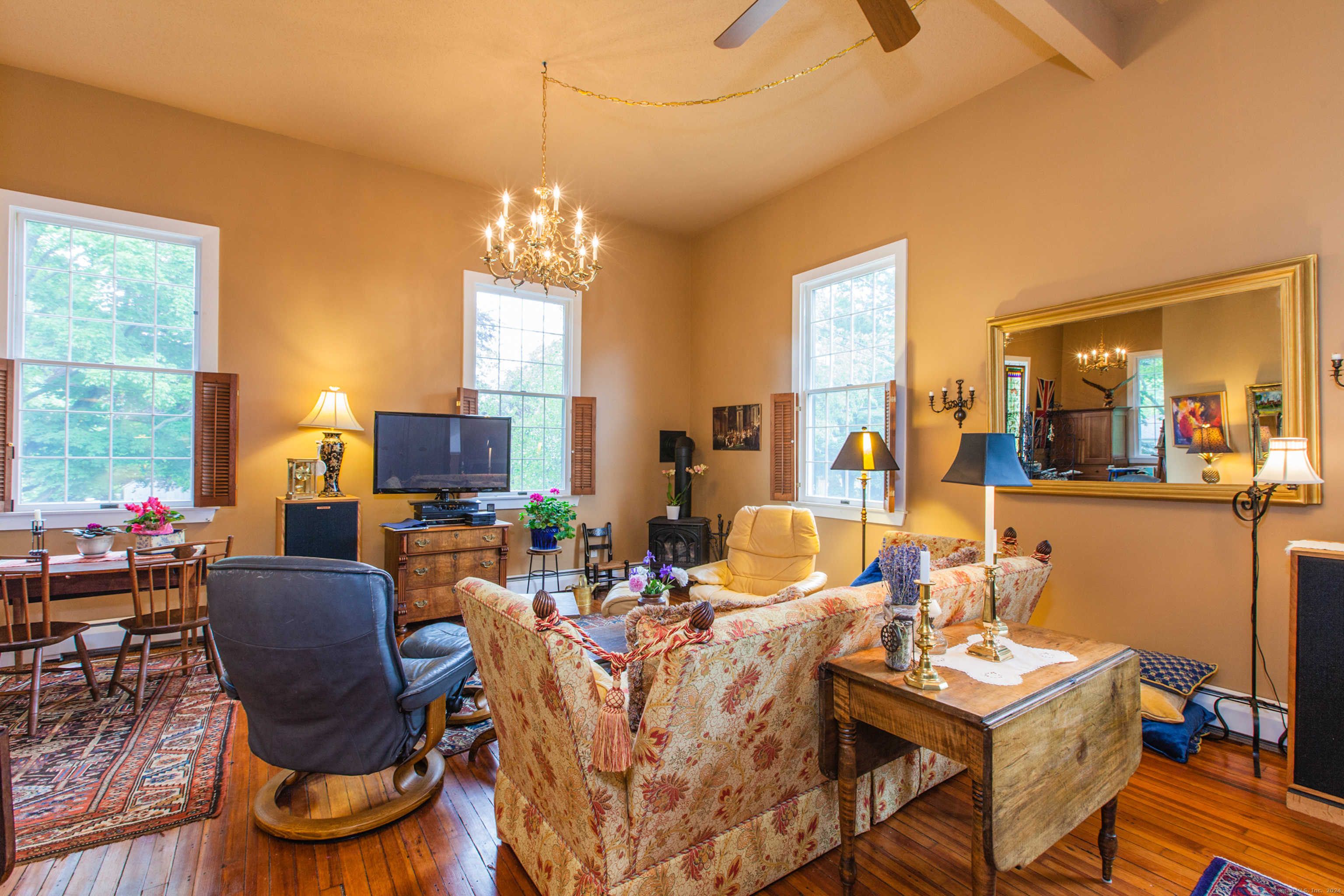 103 Boston Street, Unit C Guilford, CT 06437 - Photo 11 of 33 a view of a dining room with furniture window and outside view