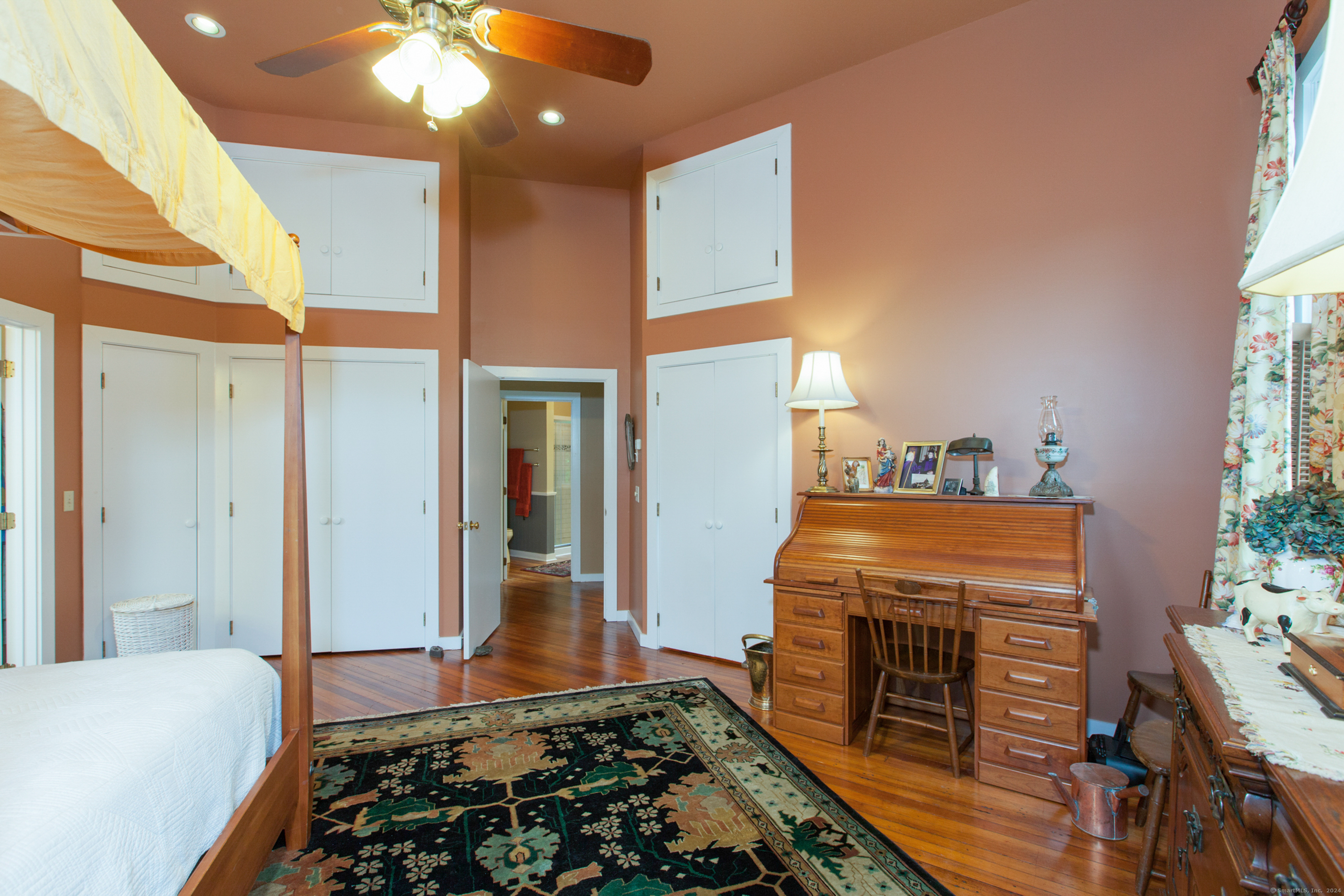 103 Boston Street, Unit C Guilford, CT 06437 - Photo 21 of 33 a bedroom with bed and a window