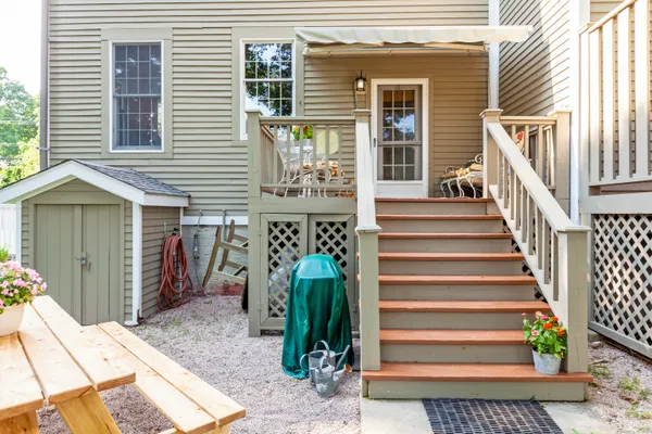 a view of a house with wooden floor and a window