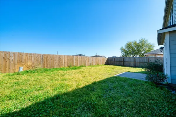 a view of a backyard with a garden