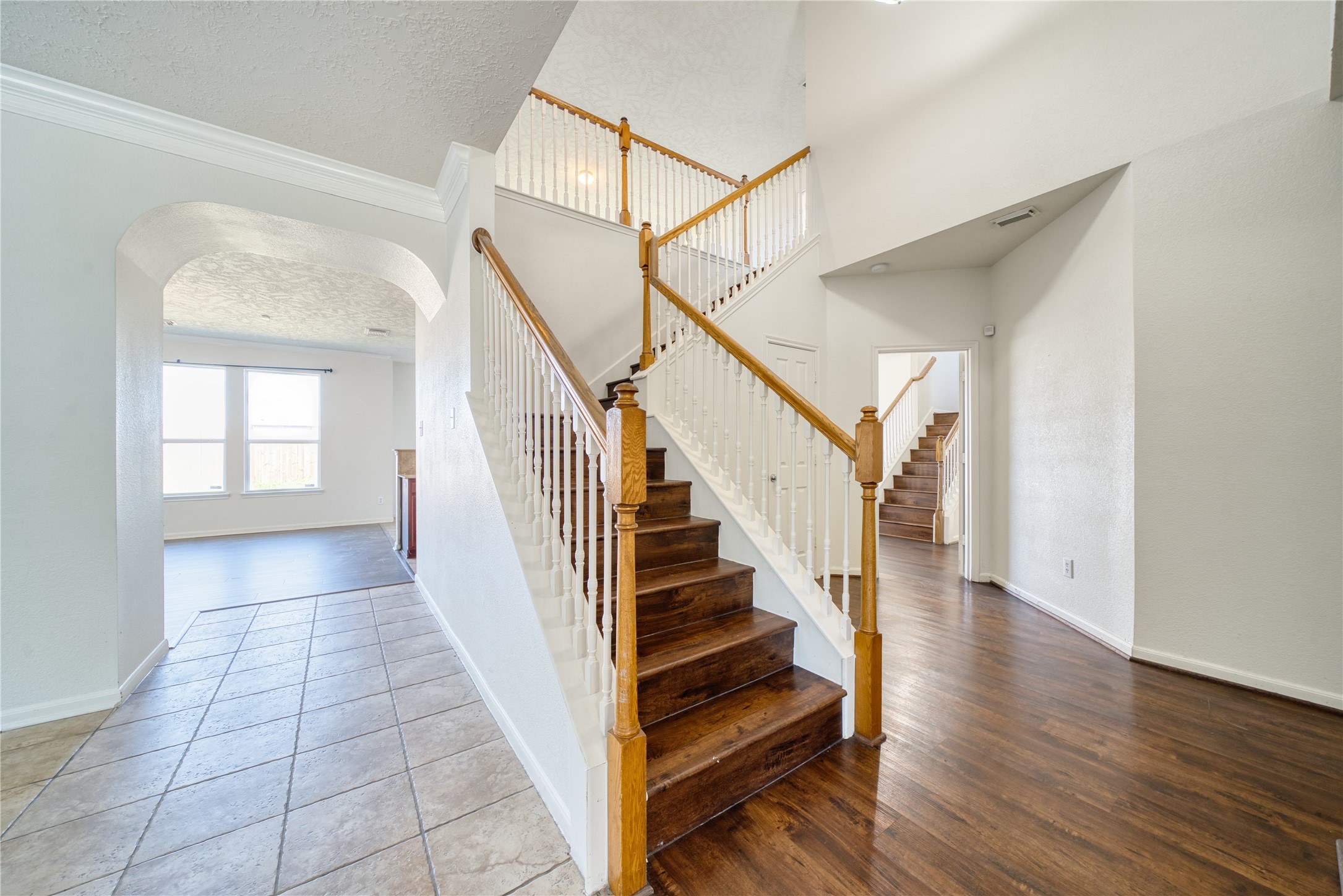 6610 Autumn Sunset Lane Spring, TX 77379 - Photo 9 of 45 a view of entryway and hall with wooden floor