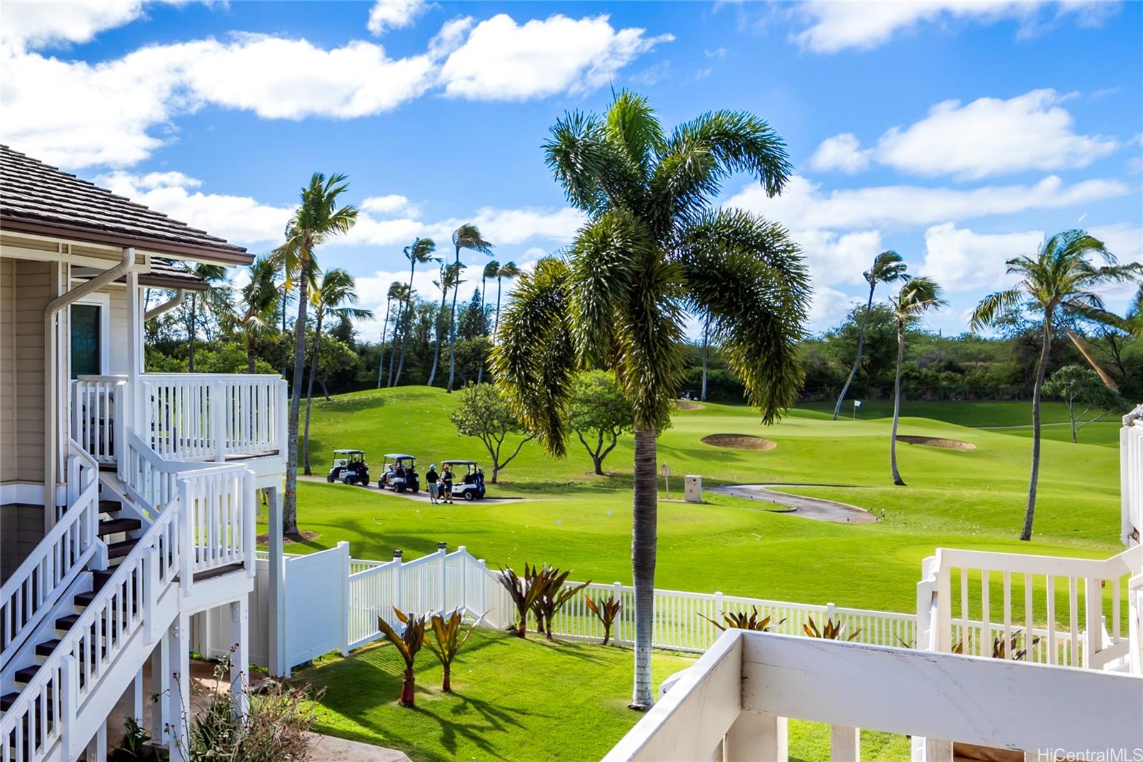 92-1475 Ali'inui Drive, Unit 20B Kapolei, HI 96707 - Photo 18 of 18 a view of a garden with swimming pool