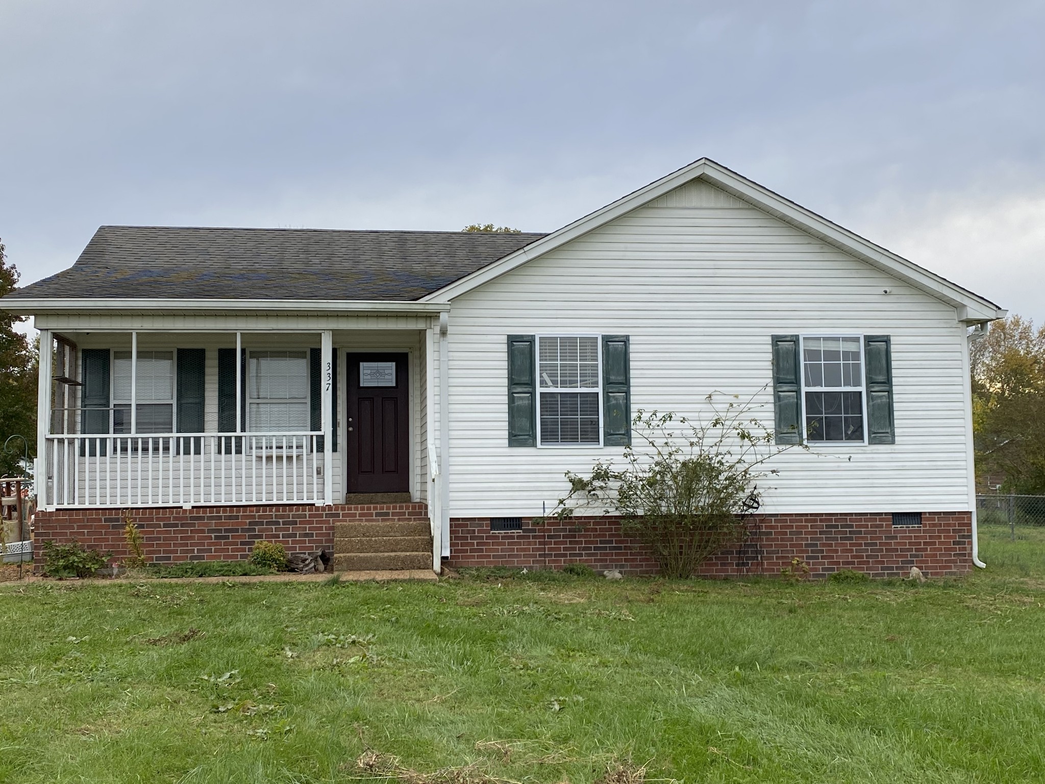 a front view of house with yard